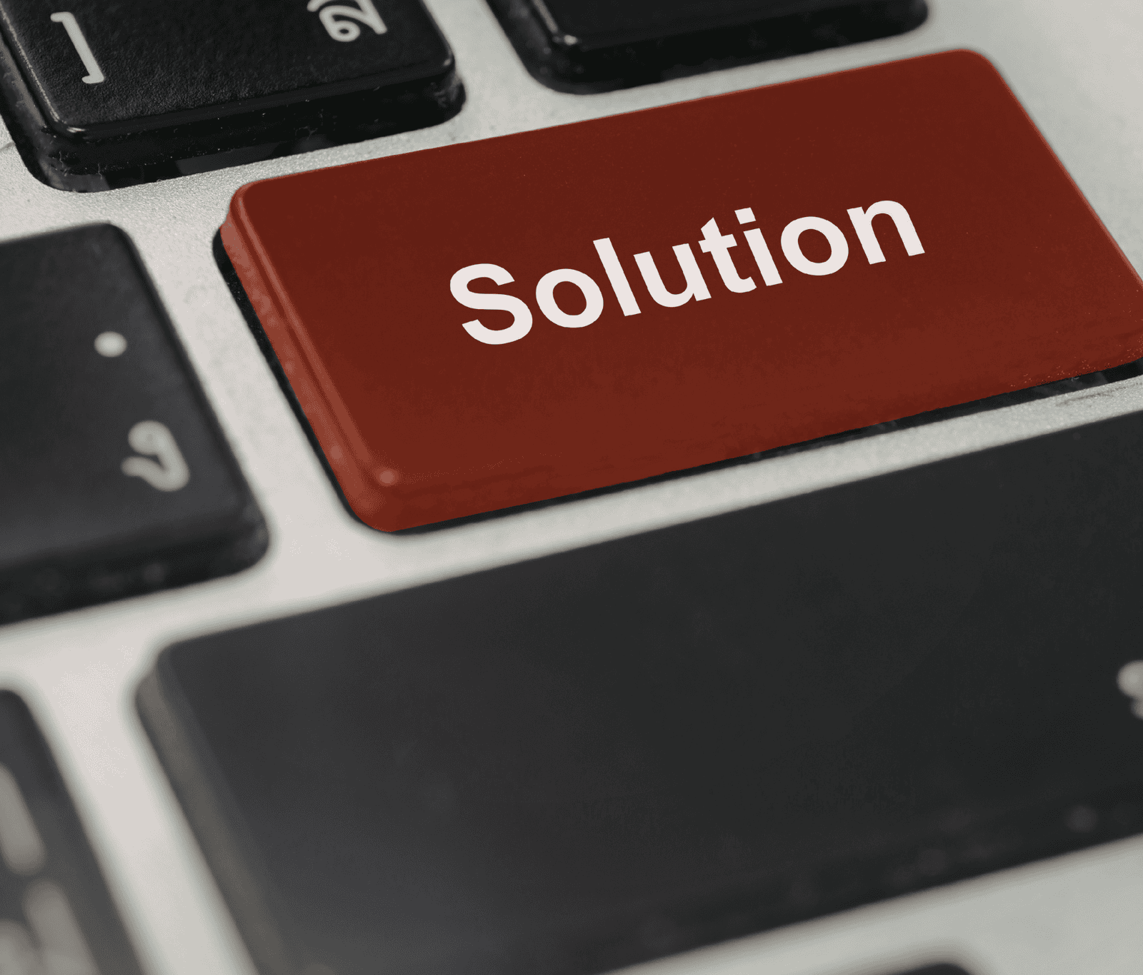 Close-up of a keyboard key labelled “Solution”, representing tailored Splicecom solutions designed to meet specific business connectivity and performance needs.