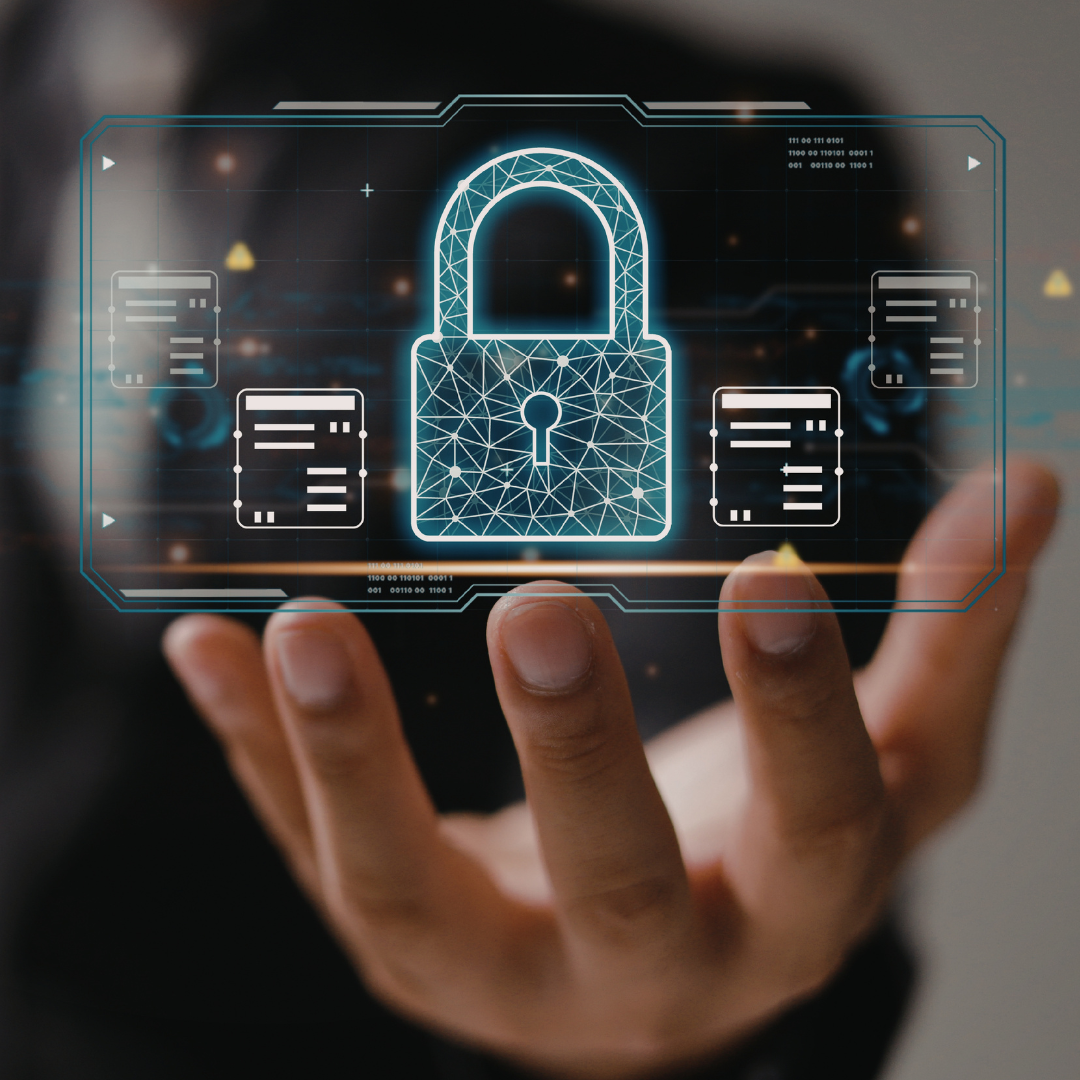 CA hand holding a digital cybersecurity interface with a glowing padlock icon and data panels, representing secure access, data protection and cyber security management.