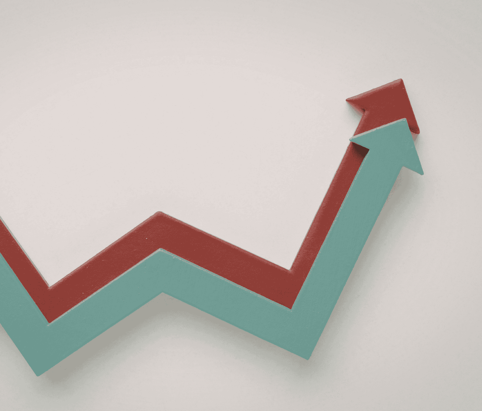 Upward-trending arrow graphic, representing improved call performance, scalability and growth through reliable VoIP communication solutions.